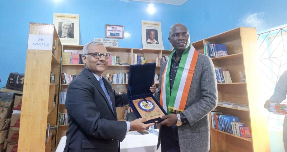 Director General, D. Nelson Bearngar (right) and India Ambassador Manoj Bihari Verma.