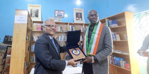 Director General, D. Nelson Bearngar (right) and India Ambassador Manoj Bihari Verma.